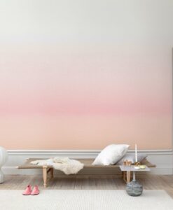a room with a pink gradient wall