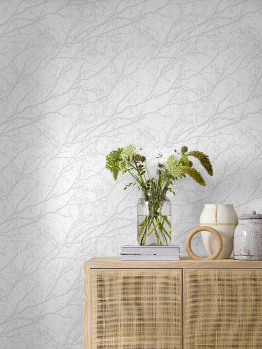 Possessing an on-trend Scandinavian aesthetic, this timeless wallpaper is achingly chic and stylish. With its stylised grey tree branches against an off-white base, it creates a look that is on-trend. Intricate yet unassuming, hang it in your bedroom or living room to effortlessly uplift your interior.